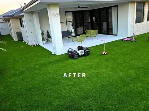Backyard with artificial turf and a paved covered alfresco